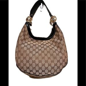 Authentic Gucci hobo with gold and silver hardware
